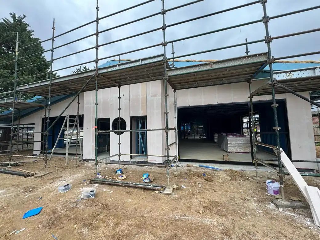 Modern Commercial Complex - Complete facade transformation using premium metal cladding